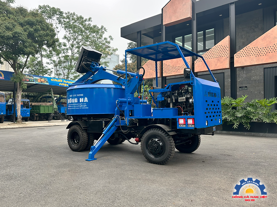 Máy trộn bê tông tự cấp liệu 15 bao 2 cầu - Ảnh 2