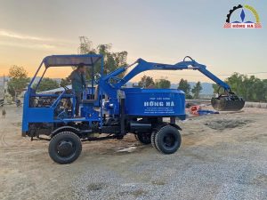 Máy trộn bê tông tự cấp liệu 12 bao 2 cầu